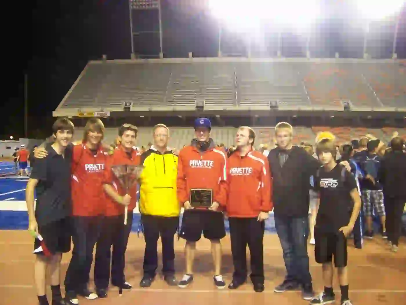 Payette Drumline group photo with Sam Bowker on the track after a competition