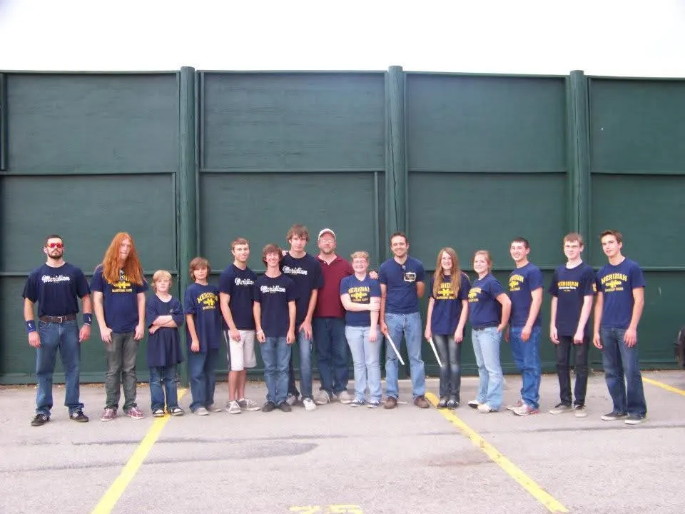 Meridian marching band percussion students posed together